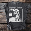 T-shirt with "everything is temporary" text and werewolf holding ice cream.