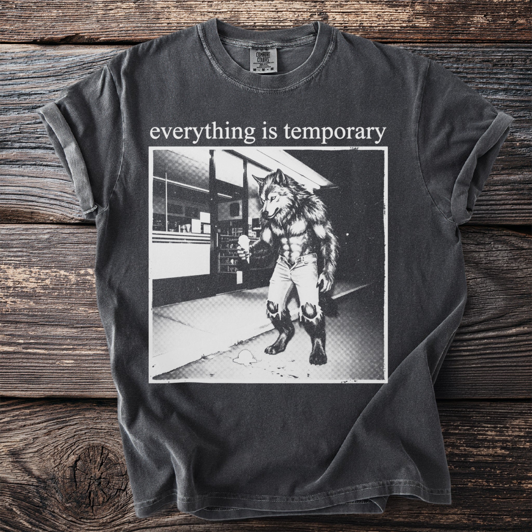 T-shirt with "everything is temporary" text and werewolf holding ice cream.