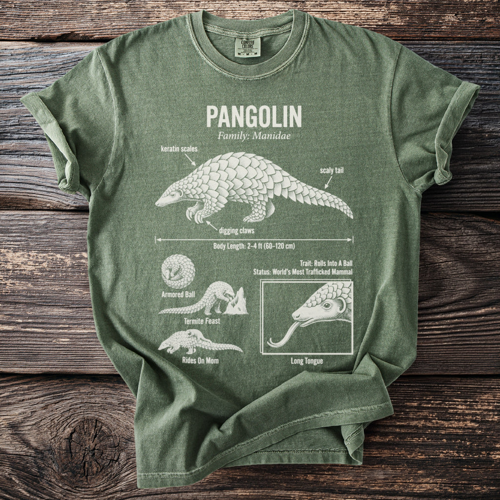 Green t-shirt with white graphic of a pangolin and its features.