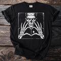 Black t-shirt with skeleton king skeleton hands forming heart shape graphic.
