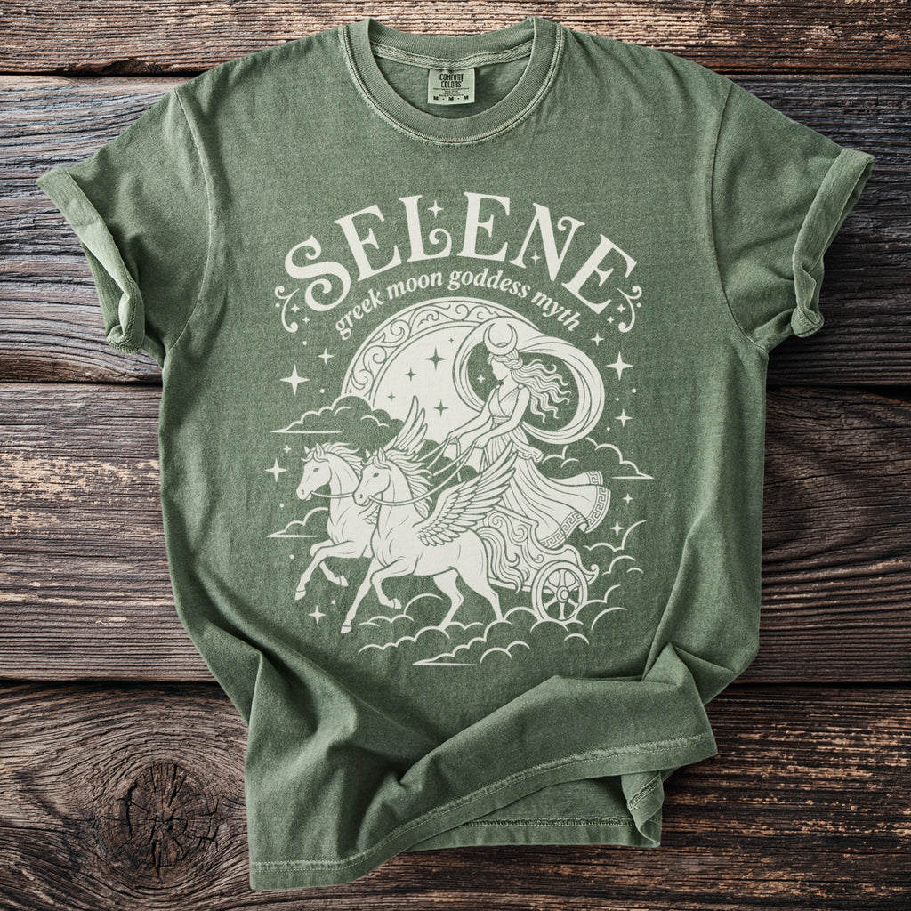 Green t-shirt with white graphic of Selene, Greek moon goddess, in chariot pulled by winged horses.