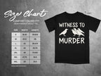 Size chart for a black adult heavyweight tee with "WITNESS TO MURDER" text.