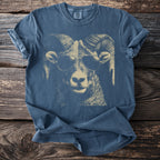 Blue t-shirt with a cream-colored graphic of a ram wearing sunglasses.