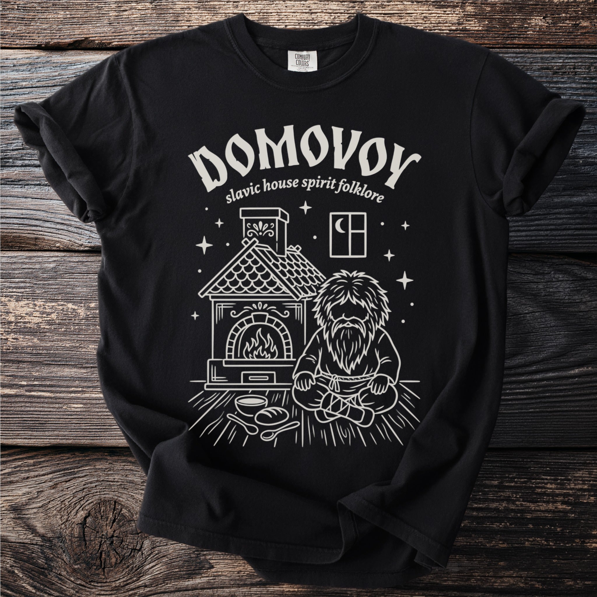 Domovoy and Slavic house spirit folklore design on a black t-shirt.