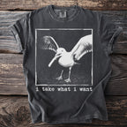 Dark grey t-shirt with a distressed seagull graphic and text "i take what i want".