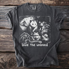 Dark t-shirt with a distressed print of an opossum, rat, raccoon, moth, frog, snake, spider, and snail, and text "love the unloved".