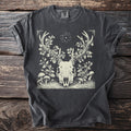 Dark grey t-shirt with a cream linocut design of a deer skull with antlers and surrounding foliage.