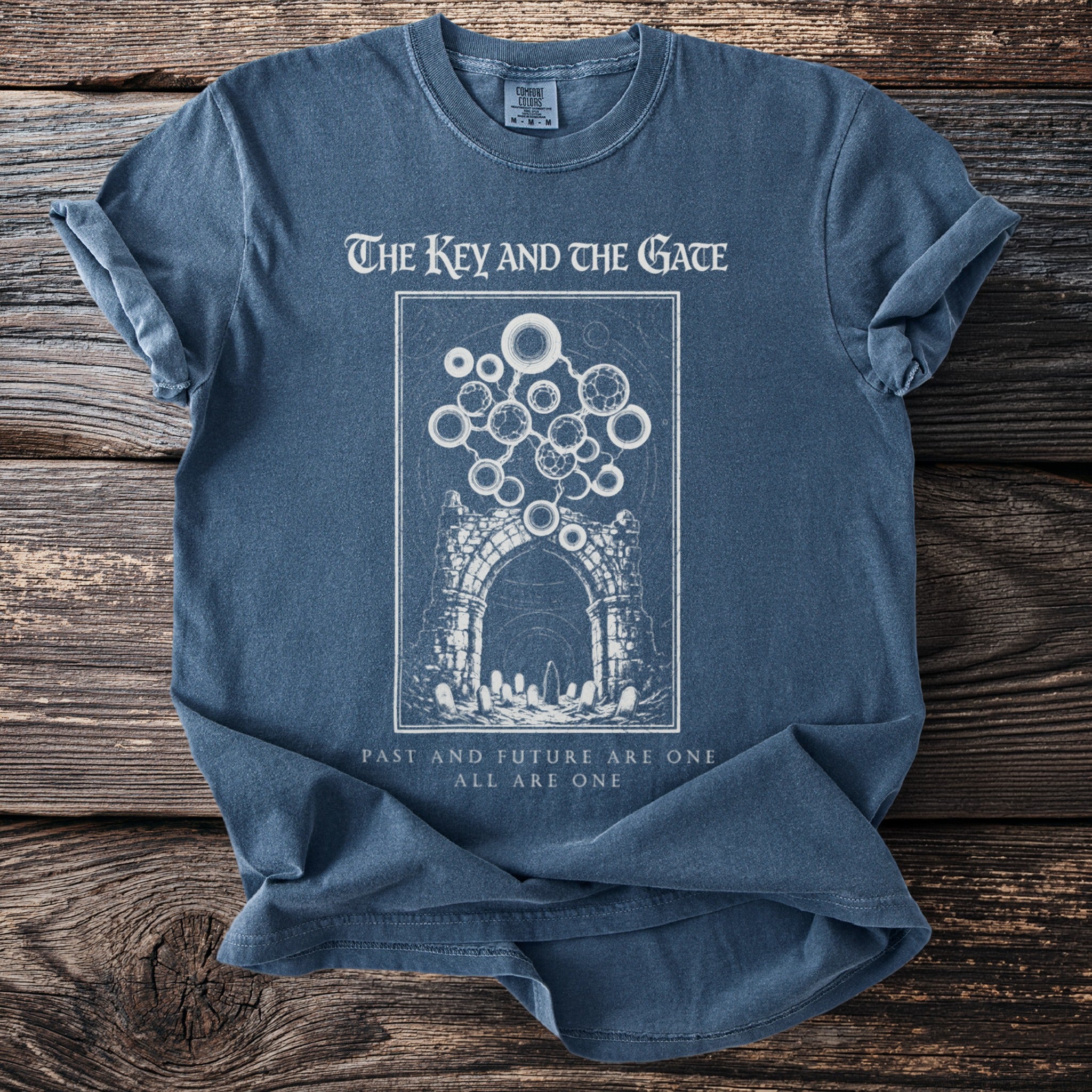 Blue t-shirt with "The Key and the Gate" graphic, featuring an archway and text.