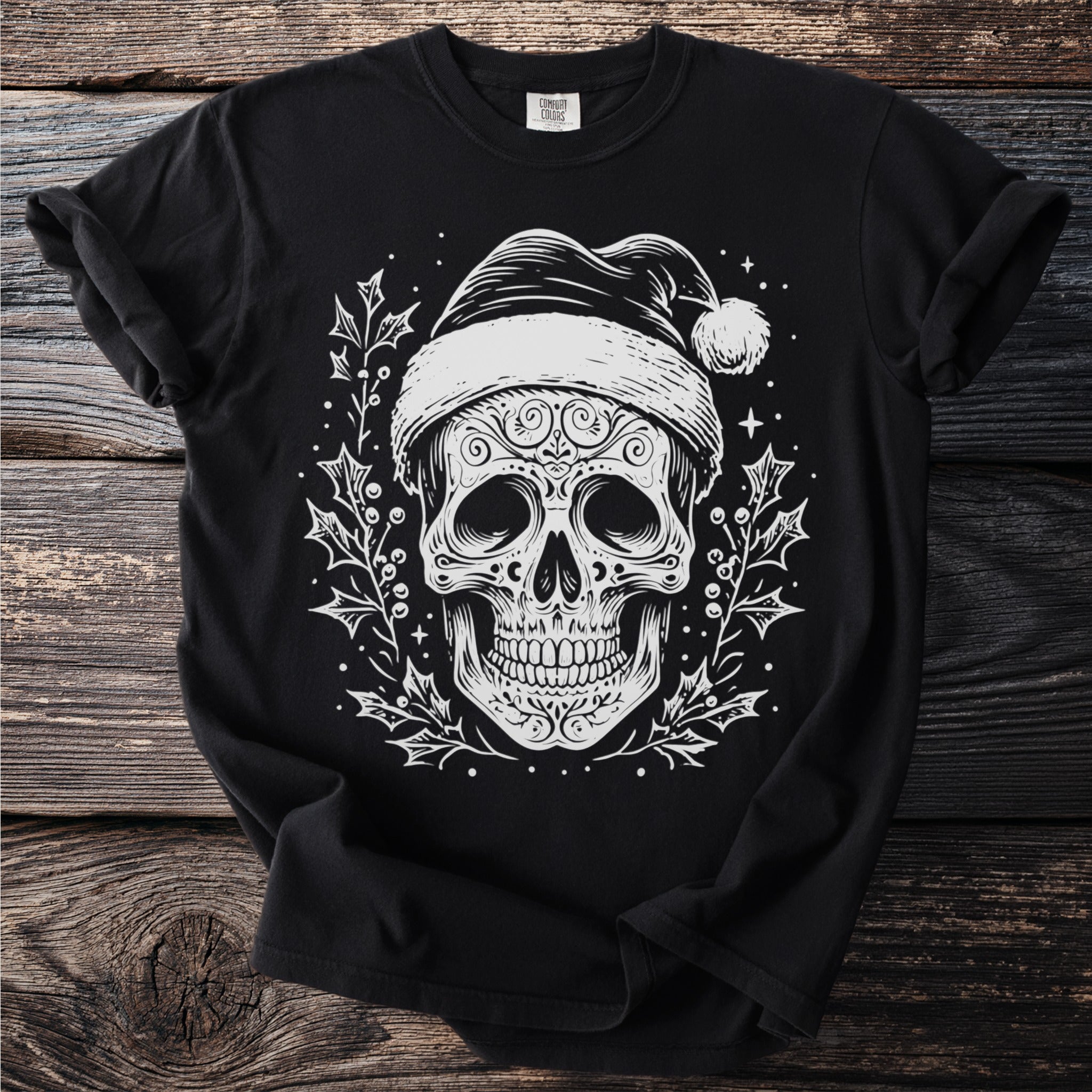 Black t-shirt with white stylized Day of the Dead skull wearing Santa hat and holly.
