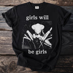 Black t-shirt with "girls will be girls" and a praying mantis graphic.