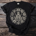 Black t-shirt with a celestial witchy mandala incorporating various plants and moons.