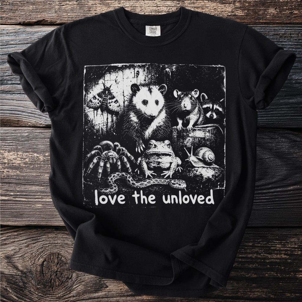 Black t-shirt with graphic of assorted animals and text "love the unloved".