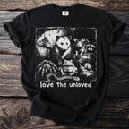 Black t-shirt with graphic of assorted animals and text "love the unloved".