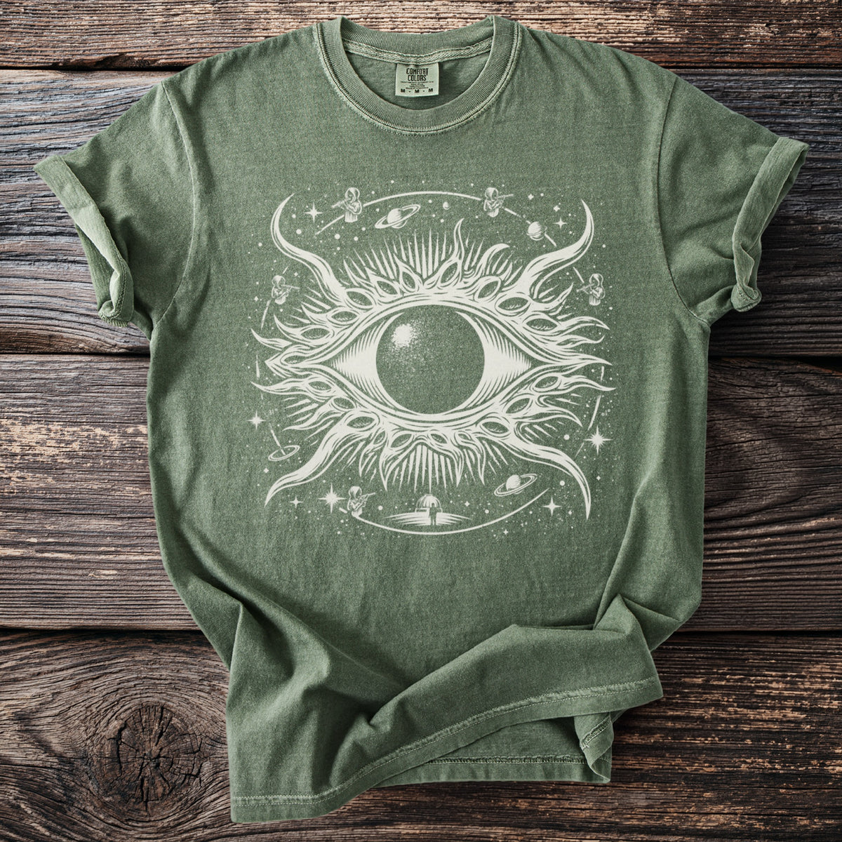 Green t-shirt with a white cosmic eye and astronaut graphic.