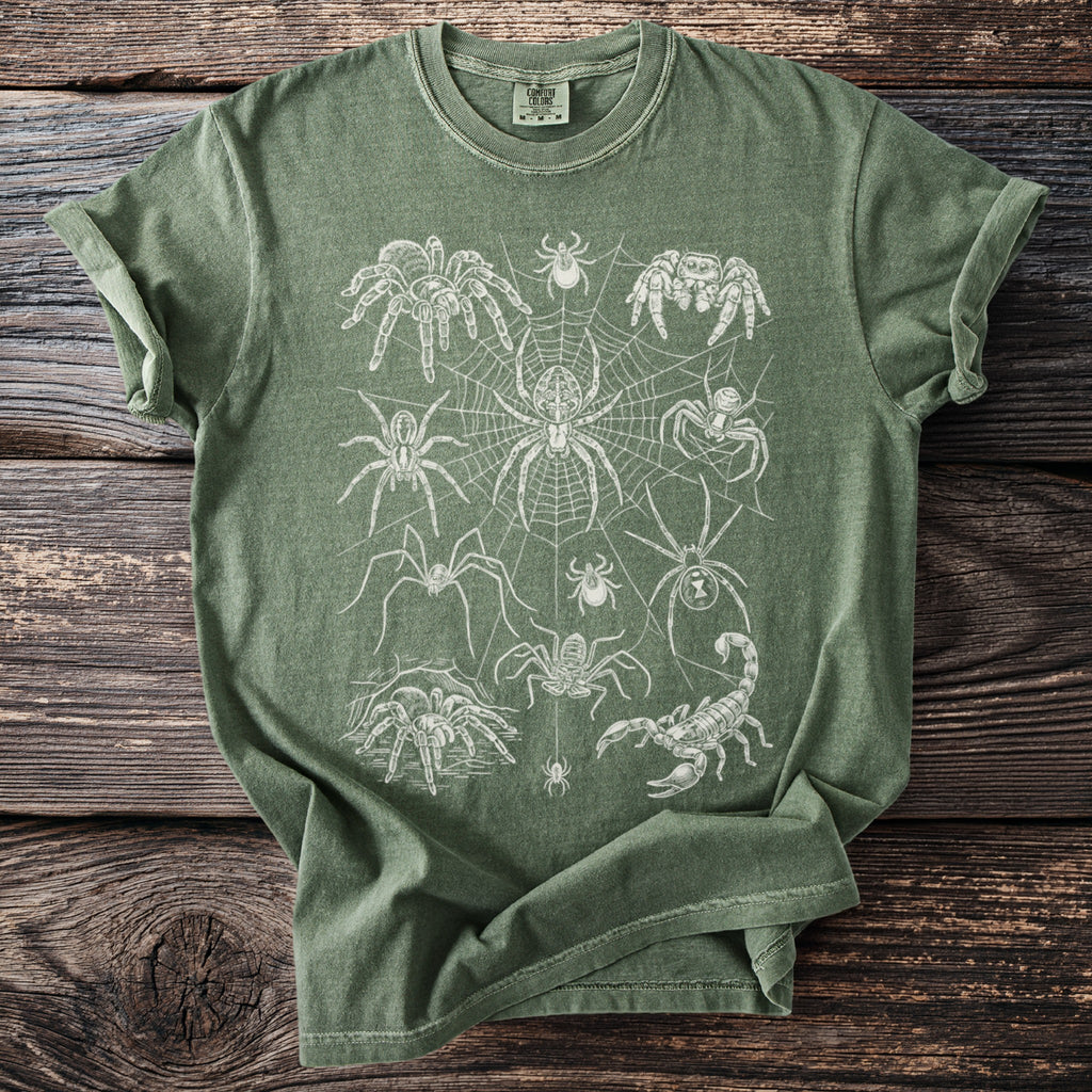 Green Comfort Colors t-shirt with white line art insects and arachnids pattern.