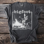 Bigfoot t-shirt graphic with text "bigfoot grabbed my weiner" and Bigfoot cooking by a fire.