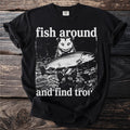 Black t-shirt with opossum holding a trout and text "fish around and find trout".