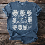 Blue t-shirt with white line art of feline faces and text "respect the locals"