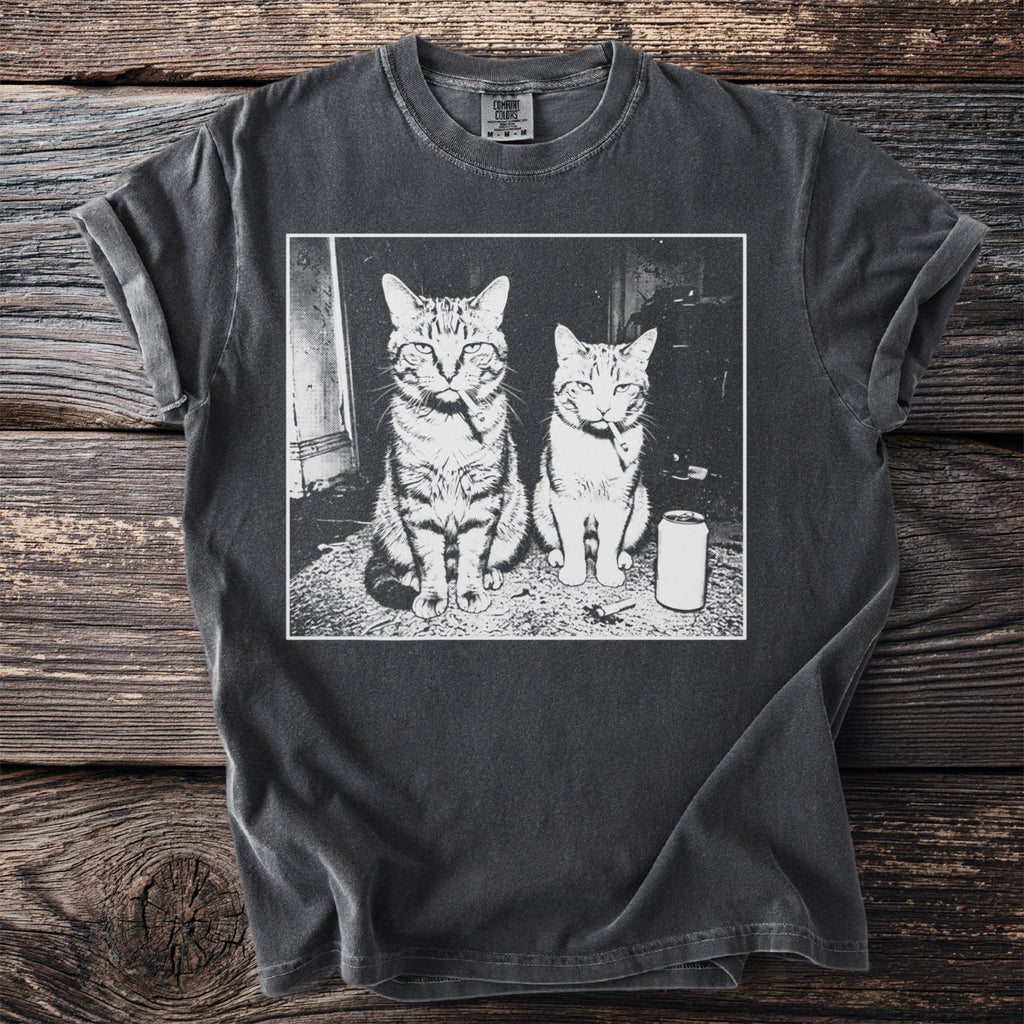 Dark grey t-shirt with print of two cats with cigarettes and a soda can.