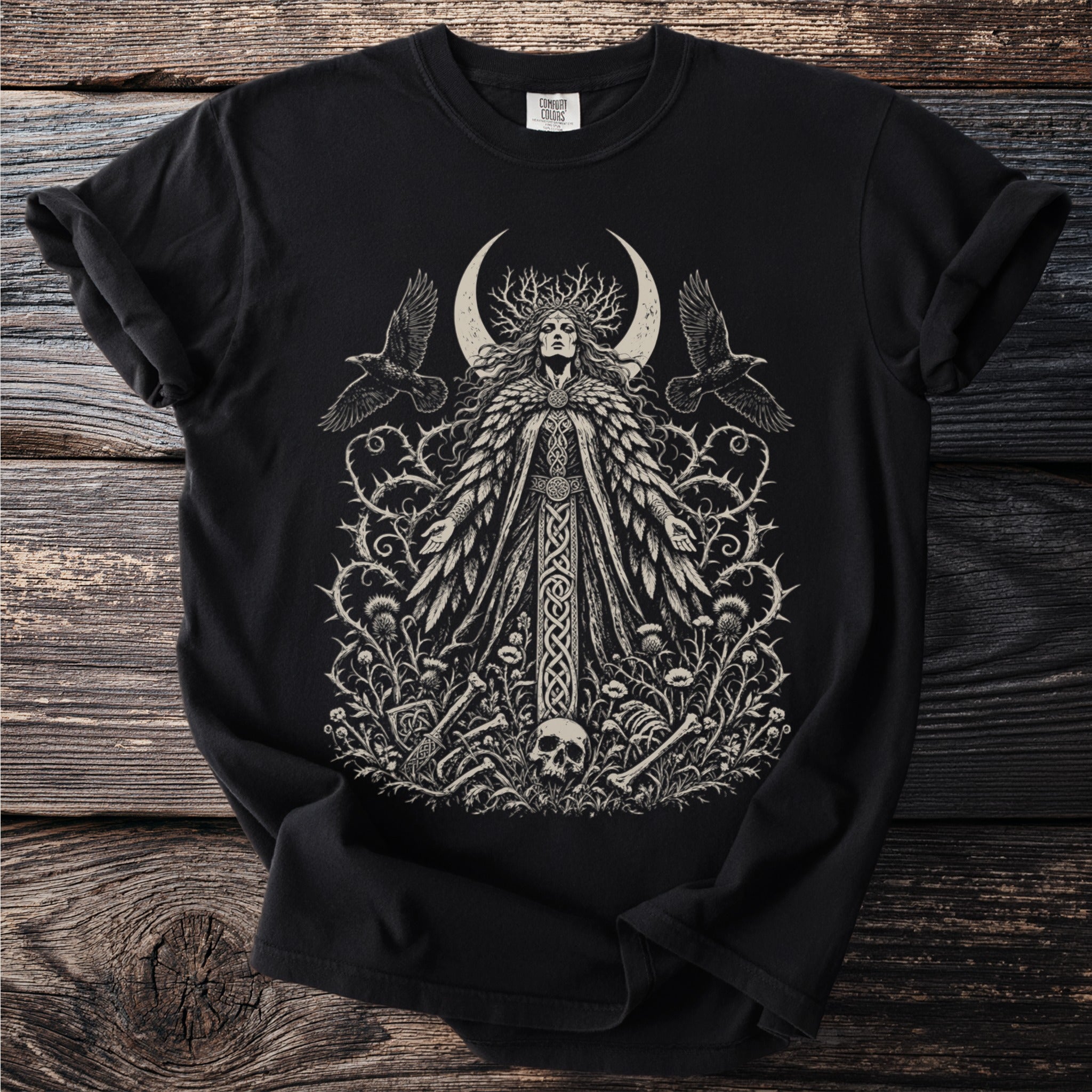 Black t-shirt with ornate illustration of a crowned woman, crescent moon, and crows.