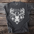 Dark t-shirt with white graphic of deer skull, antlers, skulls, and Christmas lights.