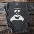 Dark grey t-shirt with a black plague doctor mask and heart hands graphic.