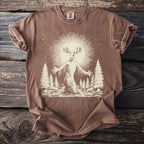 Brown comfort colors t-shirt with a pale tan graphic of a deer-headed cryptid in a forest.