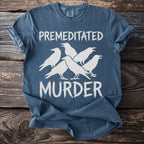 Blue t-shirt with "PREMEDITATED MURDER" and white silhouette of five crows.