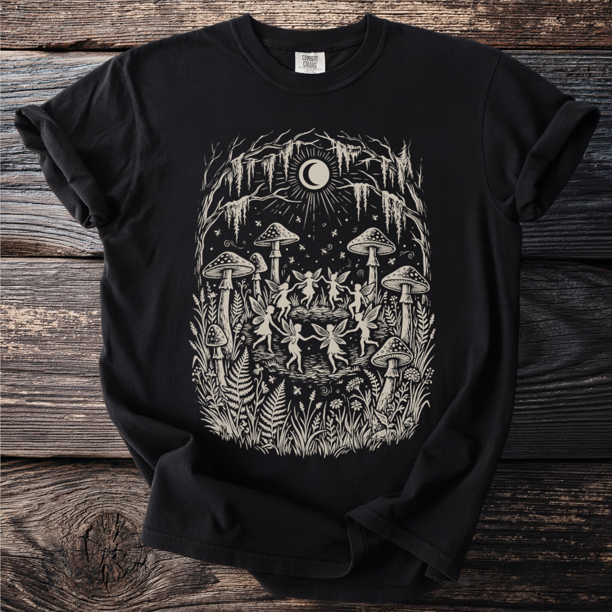 Black t-shirt with fairy circle design, mushrooms, and moon.