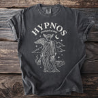 Dark t-shirt with white line art of Hypnos, Greek god of sleep, holding flowers and a torch.