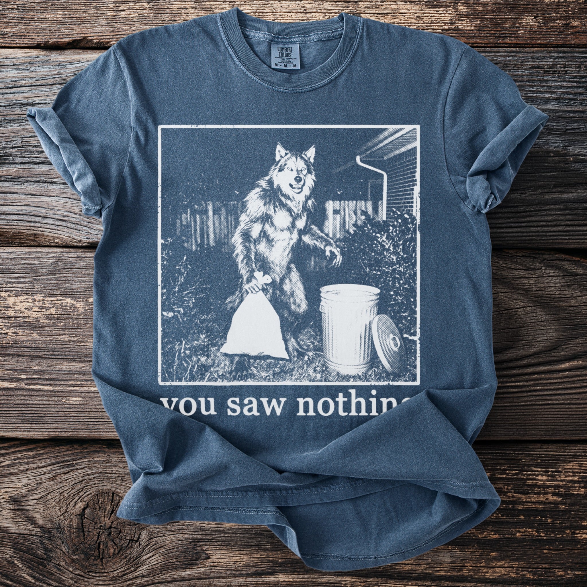 Werewolf taking out trash with a white bag under text "you saw nothing."