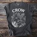 Dark gray t-shirt with white text "CROW" and a circular design of birds and an owl.