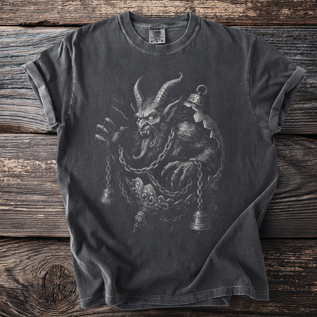 Dark t-shirt with a detailed black and white graphic of a monstrous horned creature.