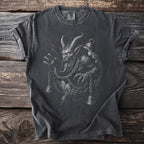 Dark t-shirt with a detailed black and white graphic of a monstrous horned creature.