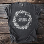 Dark grey t-shirt with a wreath of insects including bot fly, tick, leech, sea lamprey and tongue-eating louse.