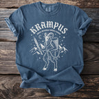Blue t-shirt with Krampus alpine folklore demon graphic and text.