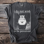 Dark gray t-shirt with a capybara in water and text "i do not wish to be perceived".