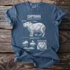T-shirt with capybara illustration detailing body length, webbed feet, and habits.