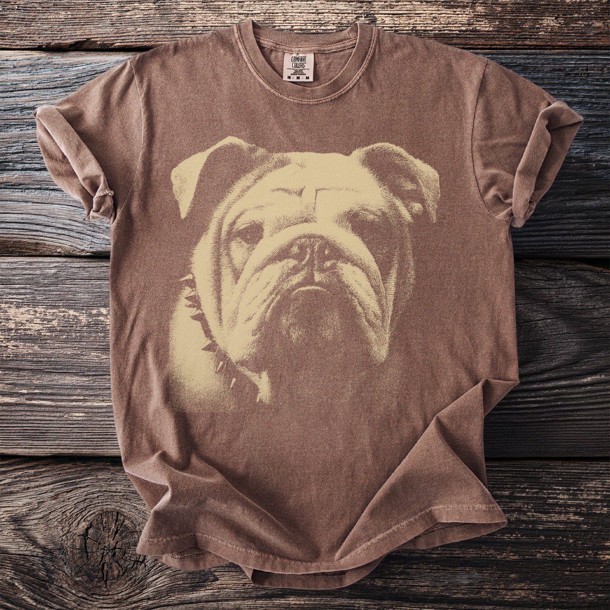 Brown t-shirt with distressed bulldog graphic and short sleeves.