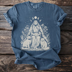 T-shirt with a woman, two cats, moon phases, and floral designs.