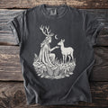 Dark t-shirt with white graphic of woman with antlers and a deer in forest.