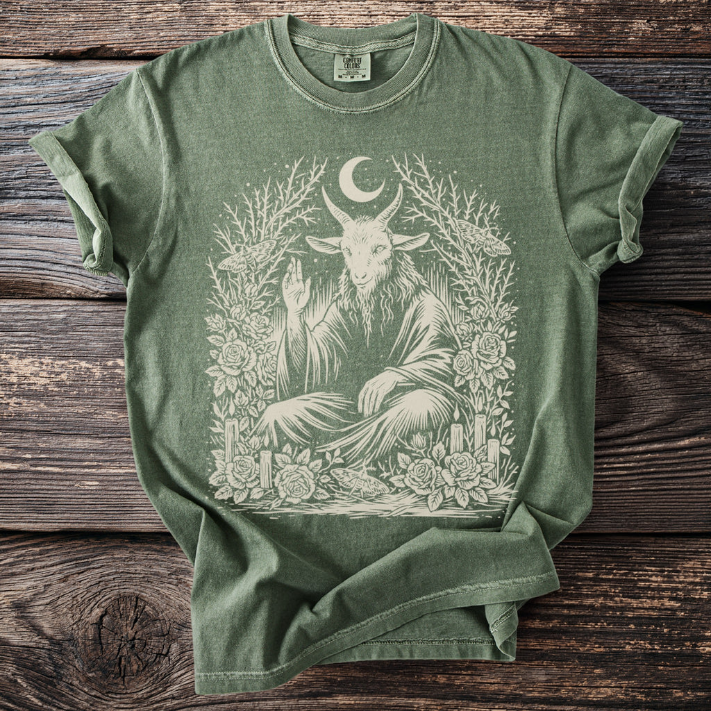 Green t-shirt with Baphomet, moon, moths, roses, and candles graphic design.