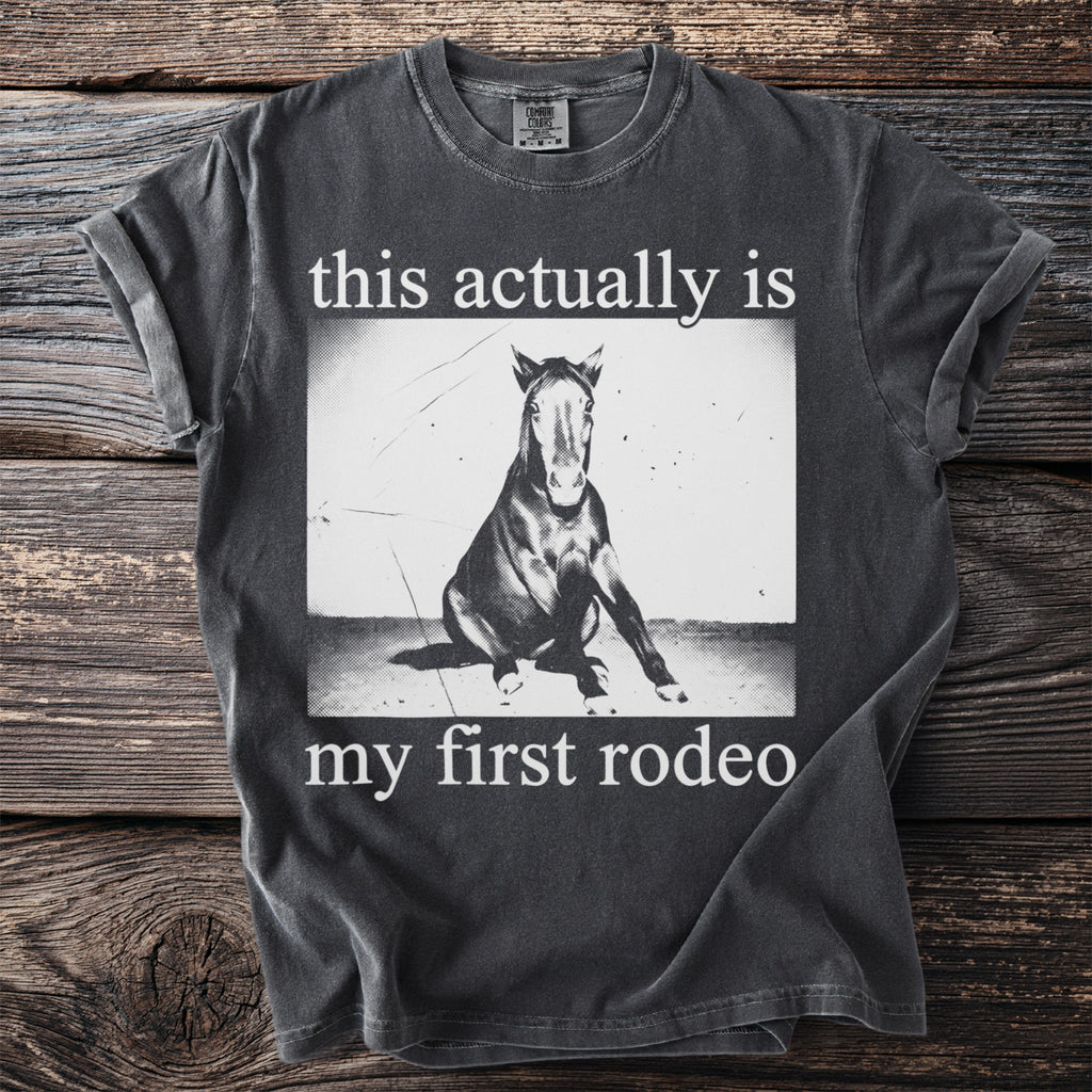 Dark grey t-shirt with horse and "this actually is my first rodeo" text.