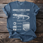 T-shirt graphic of an armadillo girdled lizard with anatomical details and behaviors labeled.