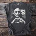 Dark gray t-shirt with a white line art graphic of Dracula making a heart shape with his hands.