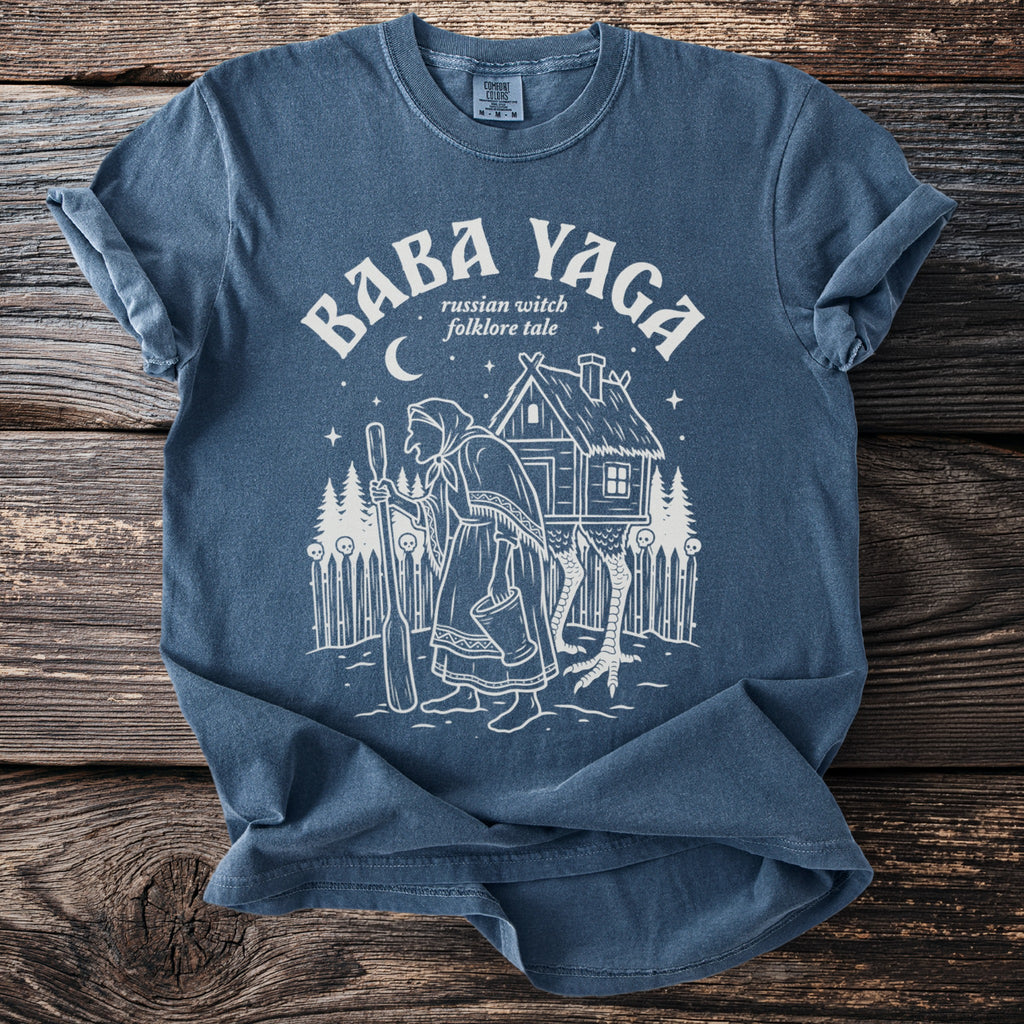 Baba Yaga russian witch folklore tale graphic on a blue t-shirt.