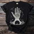 Black t-shirt with a white graphic of a hand with an eye, a gateway, and a figure.