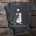 Dark gray t-shirt with a white rat and star graphic, text reads "rats spelled backwards is star".