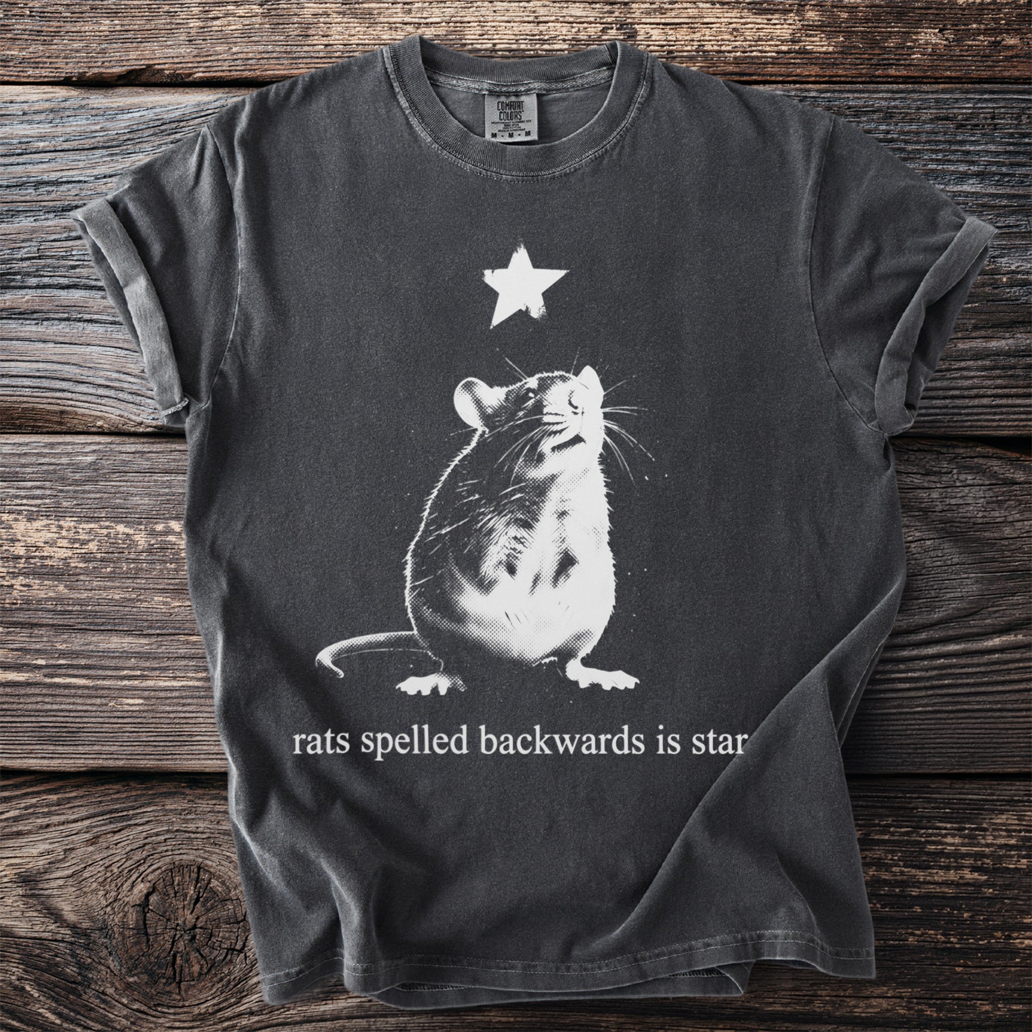 Dark gray t-shirt with a white rat and star graphic, text reads "rats spelled backwards is star".
