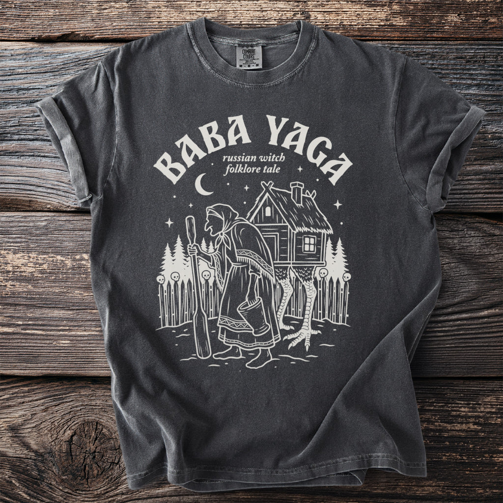T-shirt with Baba Yaga illustration and text "russian witch folklore tale"